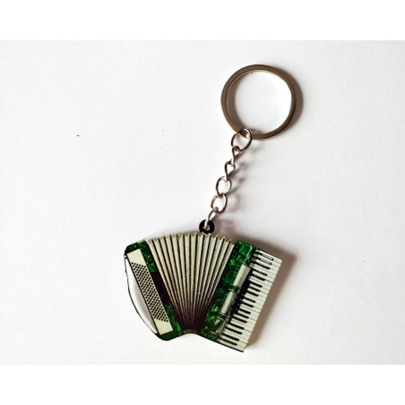 Porte-clés en forme d'accordéon vert avec touches de piano