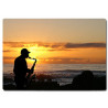 Planche à découper en verre : Saxophoniste sur une plage